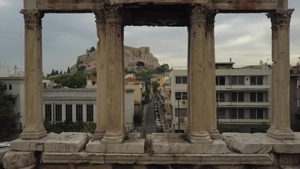 Athens monumental gateway Arch of Hadrian. Acropolis and Parthenon background