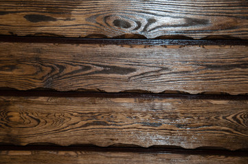 surface embossed dark brown wood varnished