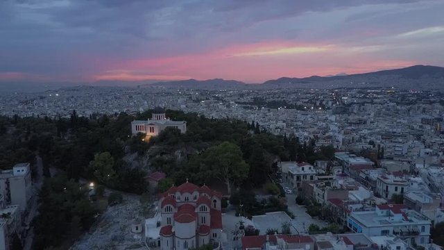 Sunset sky Athens and temples. Acropolis Parthenon in evening. Aerial drone view