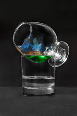 Burnt cocktail absinthe isolated black