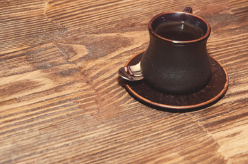 Espresso in a brown cup, background with space for text