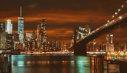 Fototapeta na wymiar Brooklyn Bridge and Manhattan at sunset, New York