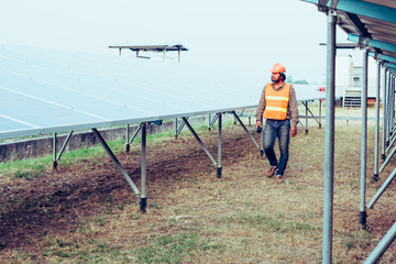 engineer working on checking equipment in solar power plant