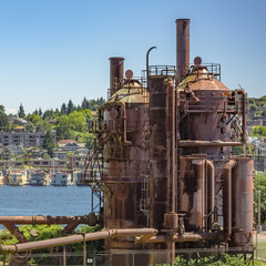 Gas plant container with view of lake and houses