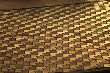 Sidewalk pattern with sunset golden light in Ibiza