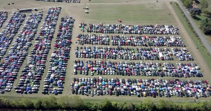 Drone Flying Sideways over Outdoor Event Parking