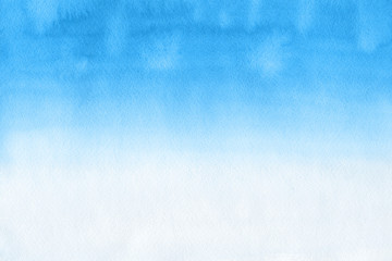 Blue winter watercolor ombre leaks and splashes texture on white watercolor paper background. Painted ice, frost and water. © artistmef