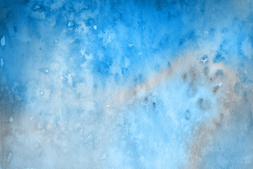 Blue winter watercolor ombre leaks and splashes texture on white watercolor paper background. Painted ice, frost and water.