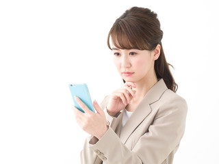 スマートフォン・悩む女性