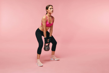 Sport Training. Athletic Woman Doing Squats With Dumbbell