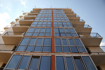 Construction of a residential multi-storey building. New residential area. 