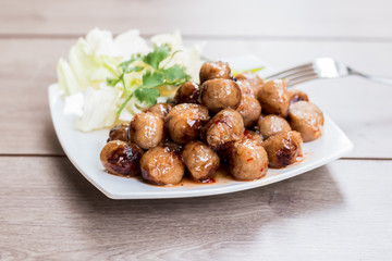Grilled sausage on dish
