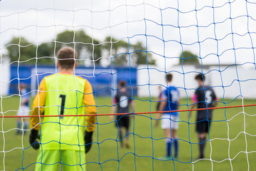 Behind the goal during a soccer match