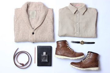 set of fashionable men's clothing and accessories on a white background top view.