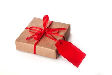 Brown Paper Package with Red Ribbon and Label