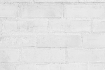 Grey and white brick wall texture background. Brickwork or stonework flooring interior rock old...