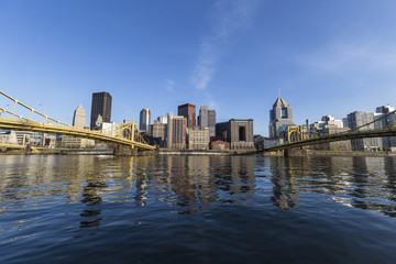 Downtown urban waterfront and bridges crossing the Allegheny River in Pittsburgh Pennsylvania.