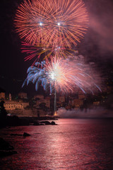 Recco fireworks in vertical , seen from sea