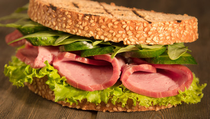 sandwich with ham and vegetables