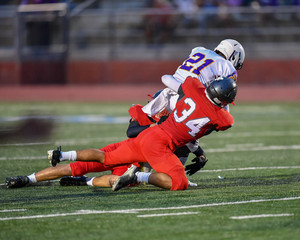 Football player making an amazing play during a game