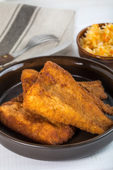 Pieces of cod in breadcrumbs.