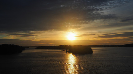 Obraz premium sunset at archipelago sea in sweden