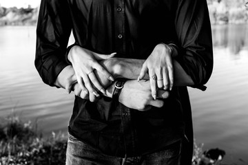 man with hands in pockets