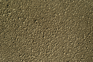 background, texture - the lunar surface, top view (in fact - wet clay with traces of rain drops)..