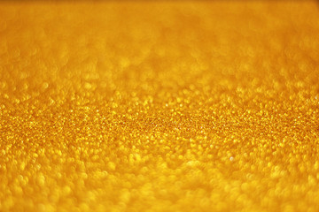 golden background, glitter, selective focus