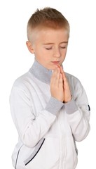 Young boy praying