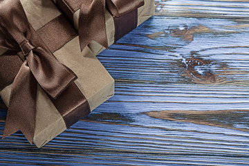 Brown boxed gifts on vintage wooden board