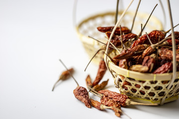 dry spice ingredient in embroidery bamboo basket 