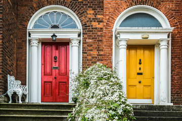 Fototapeta na wymiar Two colourful doors in Dublin, neighbour privacy but in telationship