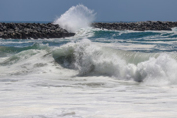 Large wave crashing at The Wedge in Newport Beach