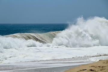 Large wave crashing at The Wedge in Newport Beach