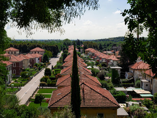 small houses with garden of the worker village of crespi d'adda recently added to the UNESCO list, Italy