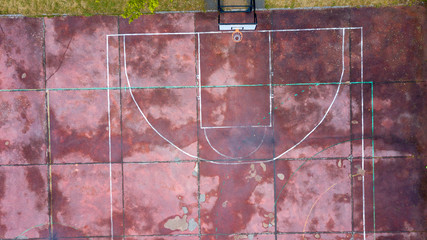 Aerial view of half outdoor basketball court.