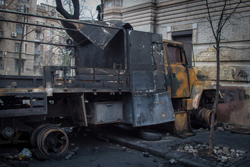 Fototapeta na wymiar Kiev Ukraine. February 23, 2014. Burned cars on the streets of the city during protests on EuroMaidan.