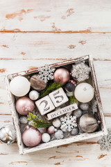 Christmas decorations and wooden blocks with 25 December Date