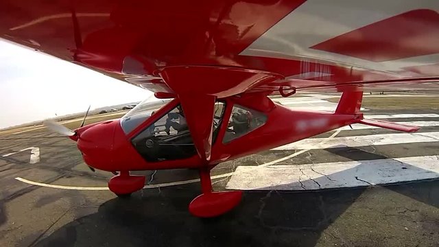 Gopro on the Airplane wing, Small Airplane Takes Off, privat airplane takeoff, red sports airplane, View from an aircraft wing, Flight on a private jet