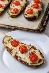 healthy bulgur stuffed eggplant with cherry tomatoes and cheese