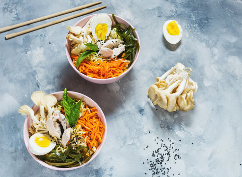 Miso Ramen Asian noodles in bowls on concrete background