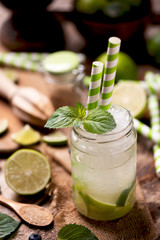 Caipirinha cocktail on wooden table
