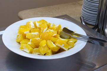 slices of oranges on a large plate