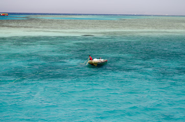 guy on a yacht in the sea