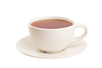 porcelainl cup with green tea on table