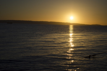 Obraz premium a yellow sunset over the sea