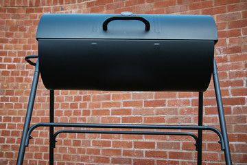Black barrel grill.