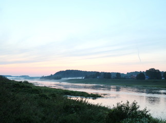 picturesque river bank at sunset
