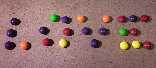 Love sign made of colorful sweet candy.